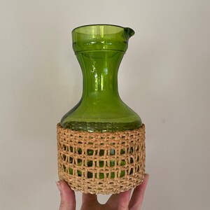 Mid Century green glass pitcher carafe with rattan wrap