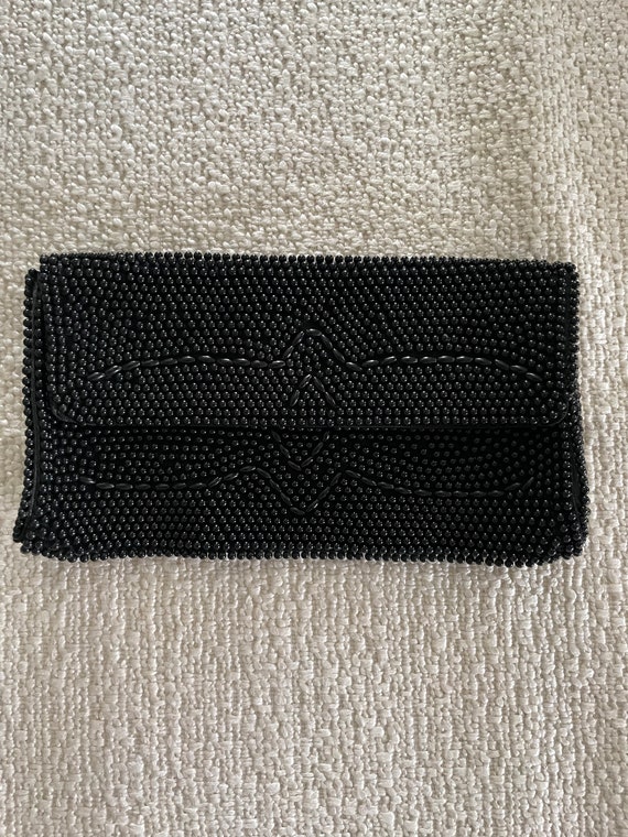 1960s black plastic beaded clutch