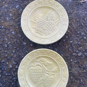 Bordallo Pinheiro yellow plates