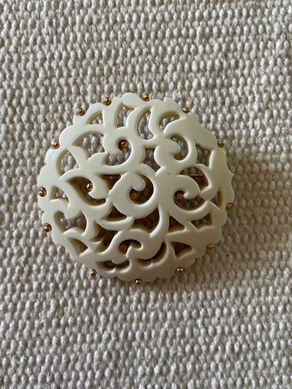 Vintage white medallion brooch by Monet - image 1