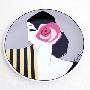 Art Deco plate with a representation of Roberto Tortoli