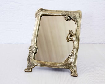 Nice bronze mirror from the 1950s.