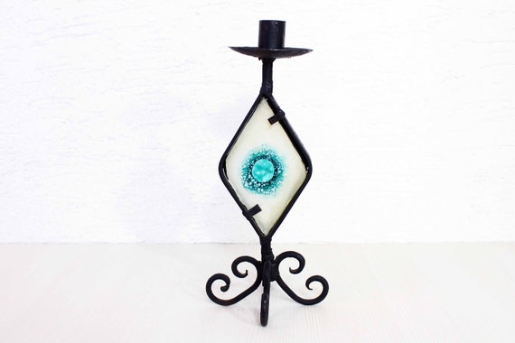 Beautiful wrought iron candle holder with stained glass. Beautiful wrought iron candle holder with stained glass.