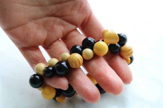 Upcycled bracelet with 1930s bakelite and cellulo… - image 3