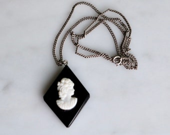 Vintage black and white cameo pendant on chain