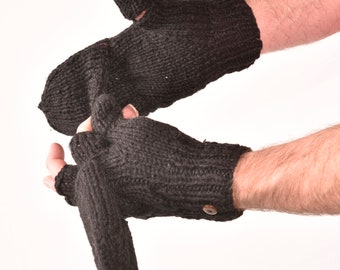 May include: A pair of black fingerless knitted gloves with a button on one glove.