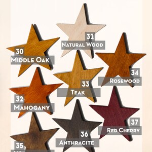 May include: A chart of ten different wood colors, each represented by a star-shaped piece of wood. The colors range from light to dark, with names like Natural Wood, Middle Oak, Rosewood, and Red Cherry.
