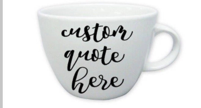 May include: White ceramic mug with a black cursive inscription that reads "custom quote here".