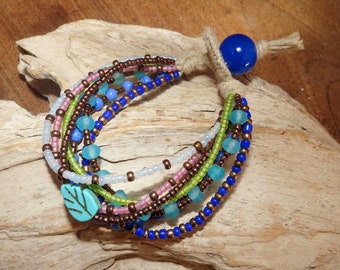 Bracelet "Gypsy" linen and 7 rows of rockeries and glass beads in multicolored tones