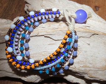Bracelet "Gypsy"  en lin et  7 rangées de rocailles et perles de verre dans les tons multicolores
