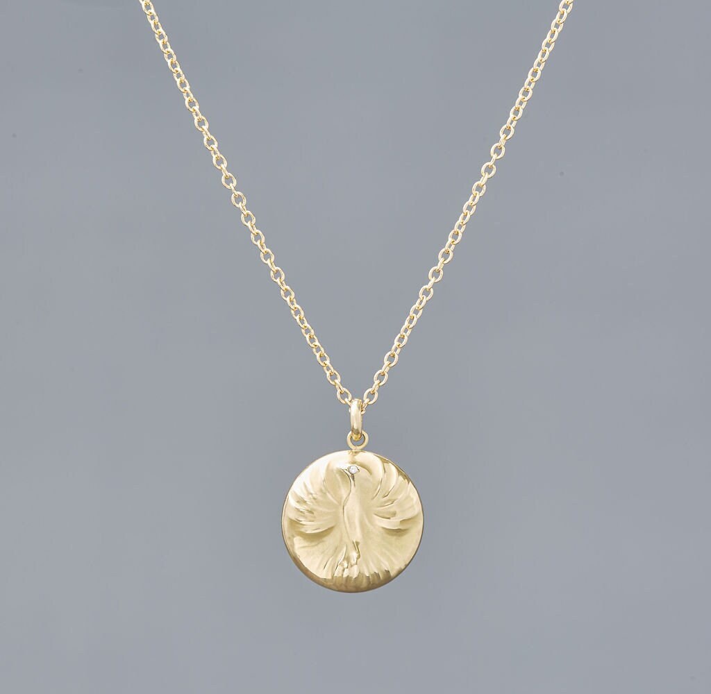 Phoenix pendant in 18k yellow gold featuring .004 ct DG VS diamond