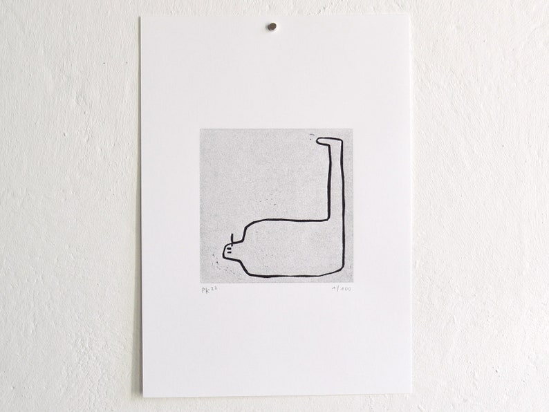 May include: Black and white line drawing of a person with a long neck and legs, printed on a textured paper. The print is numbered "1/100" and signed "Pk 23".