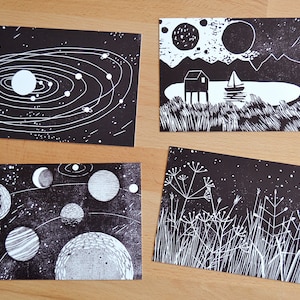 Set de postales de 4 estrellas y planetas imagen 2