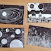 Postcard set of 4 'stars and planets'