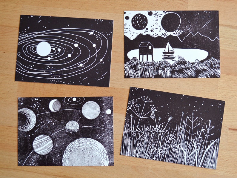 Postcard set of 4 'stars and planets' 