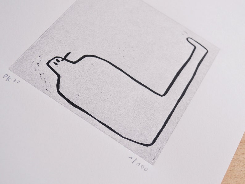 May include: Black and white line drawing of a stylized figure with a long neck and legs. The drawing is on a white background with the text "PK 22" and "1/100" in the bottom corners.