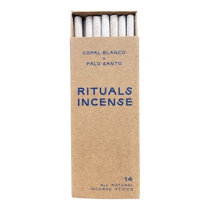 May include: A box of 14 all-natural incense sticks with a brown paper label that reads "Copal Blanco + Palo Santo Rituals Incense".