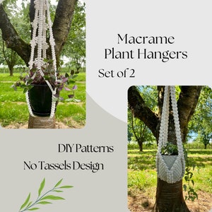 May include: Two white macrame plant hangers hanging from tree branches. The hangers are made with a knot pattern and have no tassels. The text "Macrame Plant Hangers Set of 2" and "DIY Patterns No Tassels Design" is visible in the image.