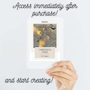 Hand holding a tablet displaying the macramé Christmas angel DIY pattern cover, with text promising immediate access after purchase.
