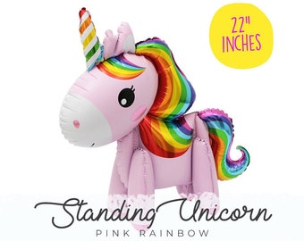May include: A pink and rainbow standing unicorn balloon, 22 inches tall.  The unicorn has a rainbow mane and tail, a rainbow striped horn, and a cute face.  "Standing Unicorn Pink Rainbow" and "Cheers Balloons" are printed on the image.