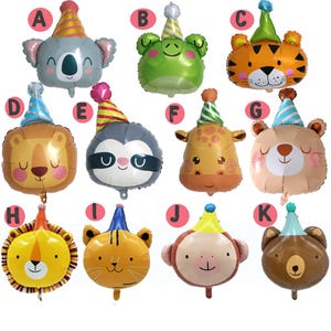 May include: Twelve colorful foil balloons featuring different animals wearing party hats. The animals include a koala, frog, tiger, lion, sloth, giraffe, bear, monkey, and more.