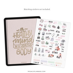 Może przedstawiać: R&oacute;żowy planer z tekstem "a healthy mind in a healthy body" w złotych literach. Planer zawiera arkusz naklejek z ilustracjami i tekstem o tematyce fitness, takimi jak "run", "cardio", "yoga" i "work it".