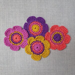 Set of 4 handmade crochet flowers in warm tones - 6 cm