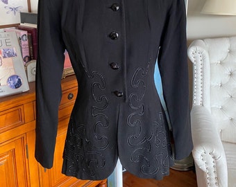 Beautiful 1940's Blazer with strong shoulder pads and beaded peplum