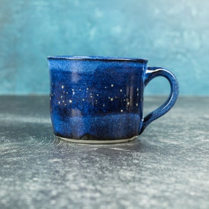 Ceramic starry night galaxy mug with cosmic blues and stars, mug for coffee, tea, and espresso