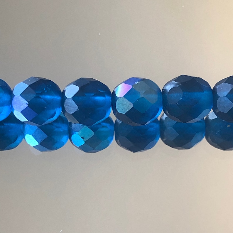 lt.blue Czech Fire Polished Round Faceted Glass Beads in Aqua color 16” strand