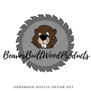 May include: A circular logo featuring a gray saw blade silhouette with a brown cartoon beaver head in the center. The text BeaverBuiltWoodProducts is written in black script across the middle, with HANDMADE-RUSTIC-DECOR-PET printed below.