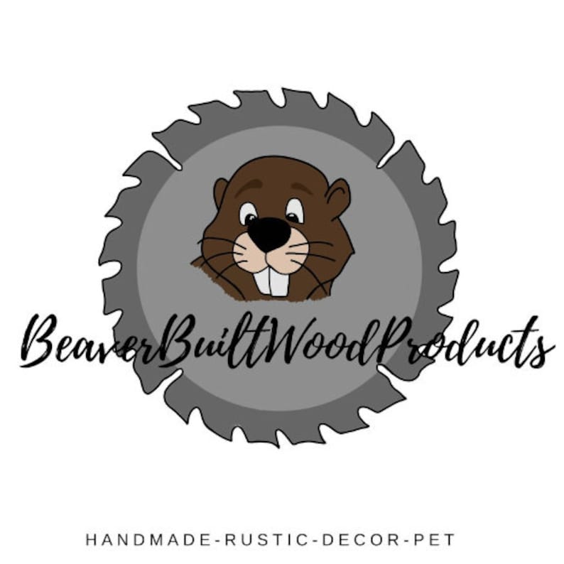 May include: A circular logo featuring a gray saw blade silhouette with a brown cartoon beaver head in the center. The text BeaverBuiltWoodProducts is written in black script across the middle, with HANDMADE-RUSTIC-DECOR-PET printed below.