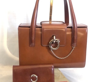Panthere de Cartier top handle bag and wallet in brown leather, silver hardware - exquisite