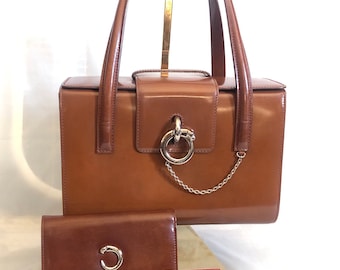 Panthere de Cartier top handle bag and wallet in brown leather, silver hardware - exquisite