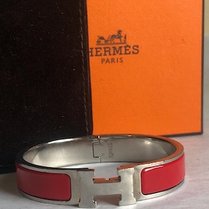 Bracelet Hermes Clic H rouge et argent modèle GM dans sa pochette et sa boîte d'origine