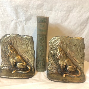 Lion in the jungle brass bookends or doorstops - antique; copper over cast iron Art Nouveau