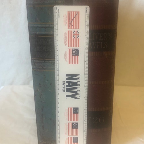 Book safes; large and inside lined; Gulliver’s travels & National shops Geographic very good condition 13”