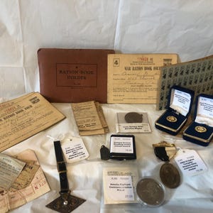 Americana Military WWI and WWII memorabilia- Knights Templar medal, Service meda rations books, medals, watch fob, holders &’mileage records