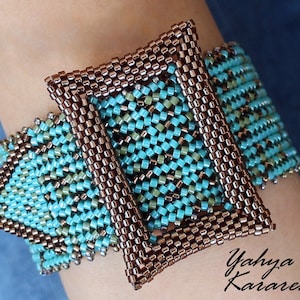 May include: A turquoise and brown beaded bracelet with a square buckle closure. The bracelet is made with small, evenly spaced beads and has a geometric pattern.