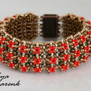 May include: A beaded bracelet with a geometric pattern in shades of gold, brown, and red. The bracelet has a clasp closure.