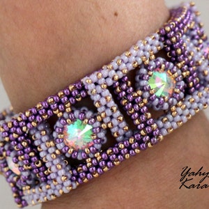 May include: A purple and gold beaded bracelet with iridescent crystal accents. The bracelet is made with small seed beads and features a geometric design.