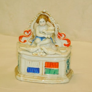 English Fairing Porcelain Fancy Figure Sitting on pillow w/ Birds & Flowers Victorian Vanity Trinket Jewel Ring Dresser Box