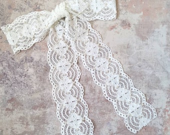 Isla lace bridal bow with freshwater pearls embroidered on Nottingham lace. bridal bow comb, veil alternative, bow wedding veil