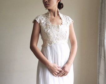 1970s wedding dress with floral lace bodice sleevesless bridal gown
