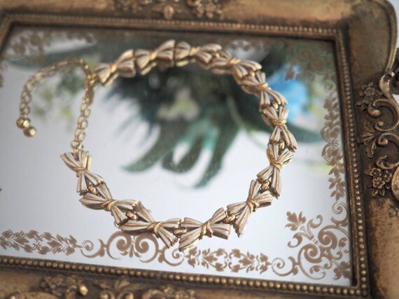 Vintage Trifari gold bow choker