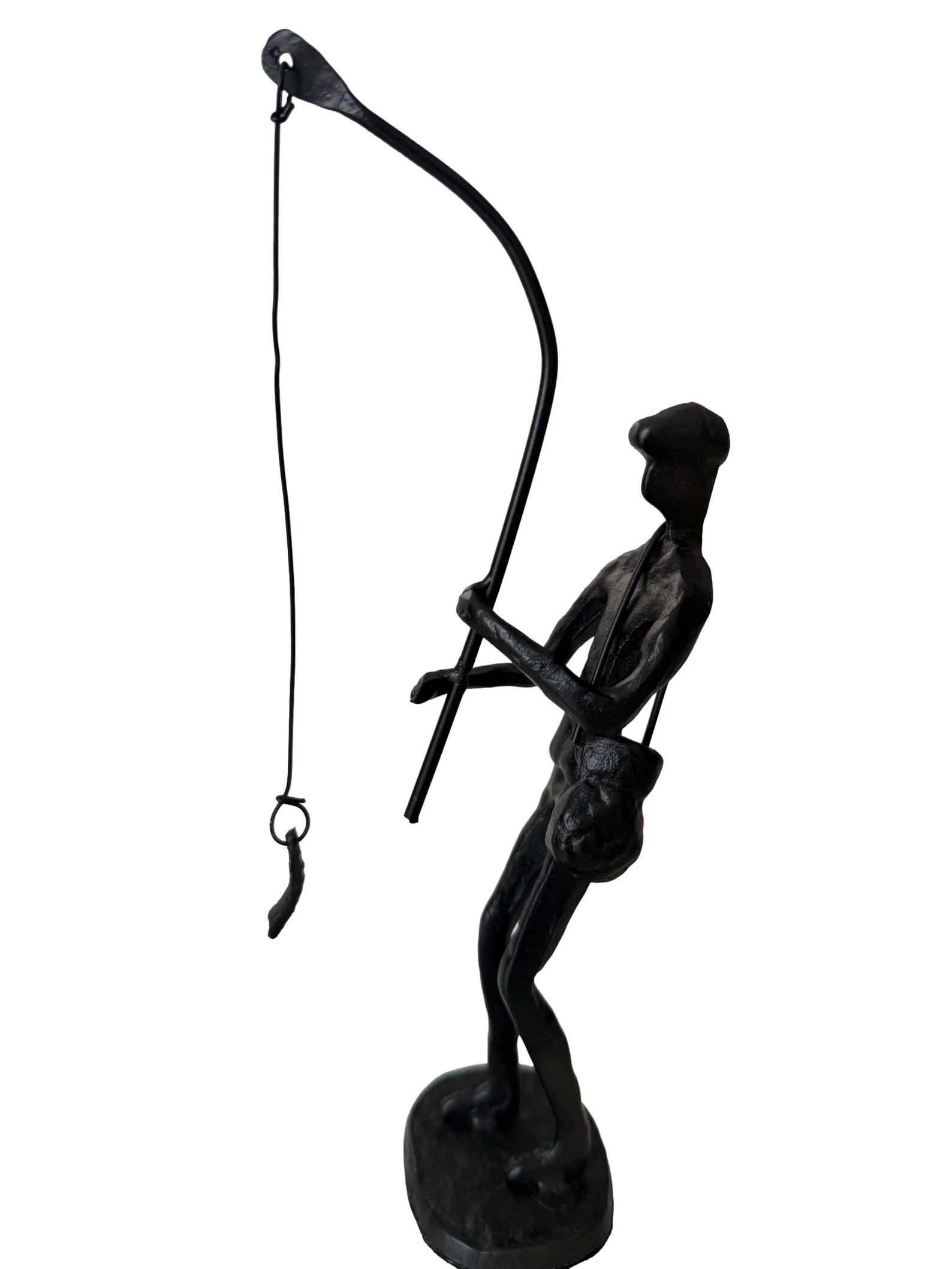 Metal Sculpture off a Man With a Fishing Rod Reeling in His Catch ...