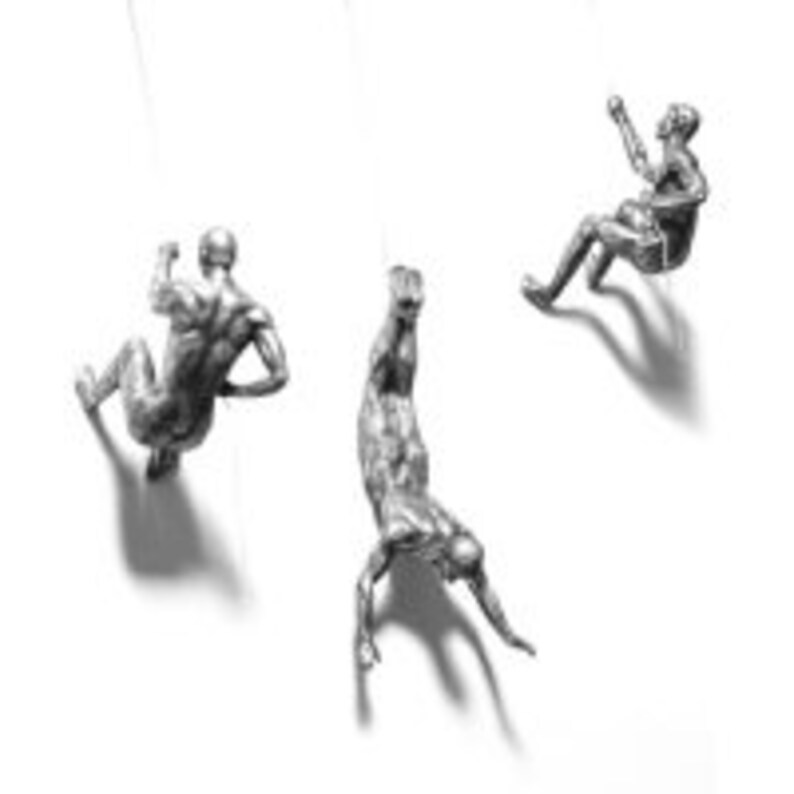 bronze abseiling figures
