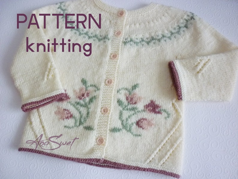 May include: A white knitted cardigan with a floral design and a button closure. The cardigan has a pink and green floral pattern and a brown trim around the edges. The text "PATTERN knitting" is visible at the top of the image.