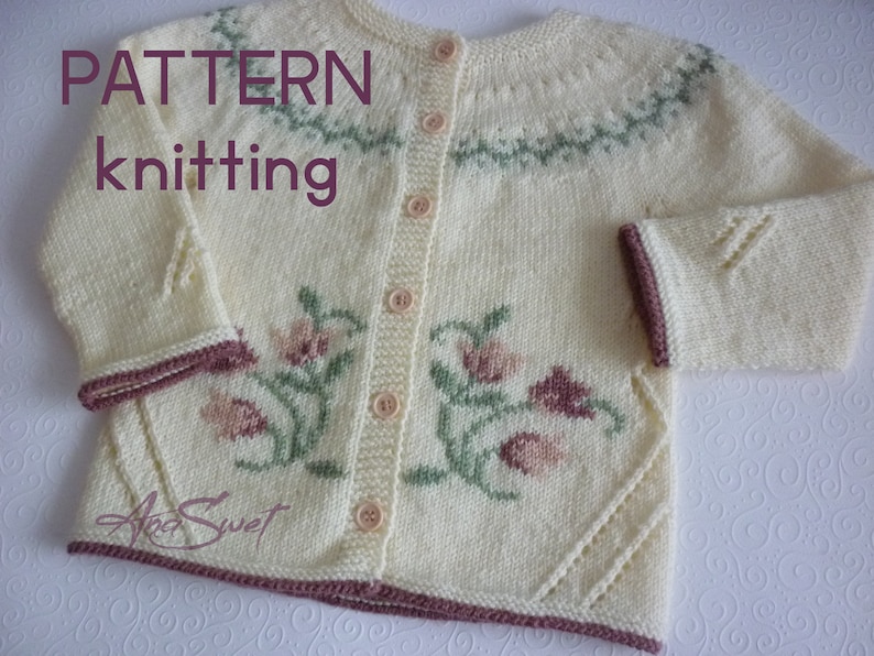 May include: A white knitted cardigan with a floral design and a brown trim. The cardigan has a button closure and a crew neck. The text "PATTERN knitting" is visible in the top left corner of the image.