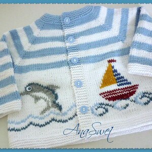 May include: A blue and white striped knitted cardigan with a sailboat and dolphin design. The cardigan has a button closure and is made of soft yarn.